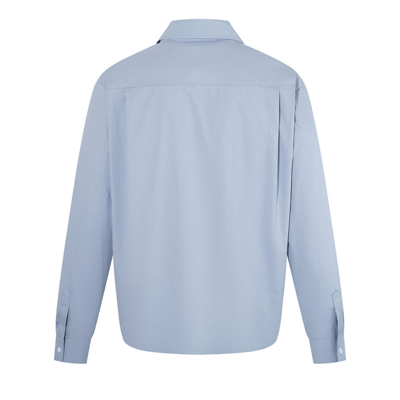 Light blue long sleeve pullover shirt shown from the back with button cuffs