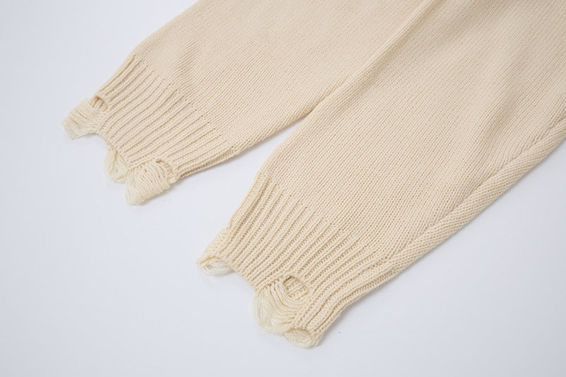 Pull en maille destroy à broderies croisées – Sweat oversize à col rond