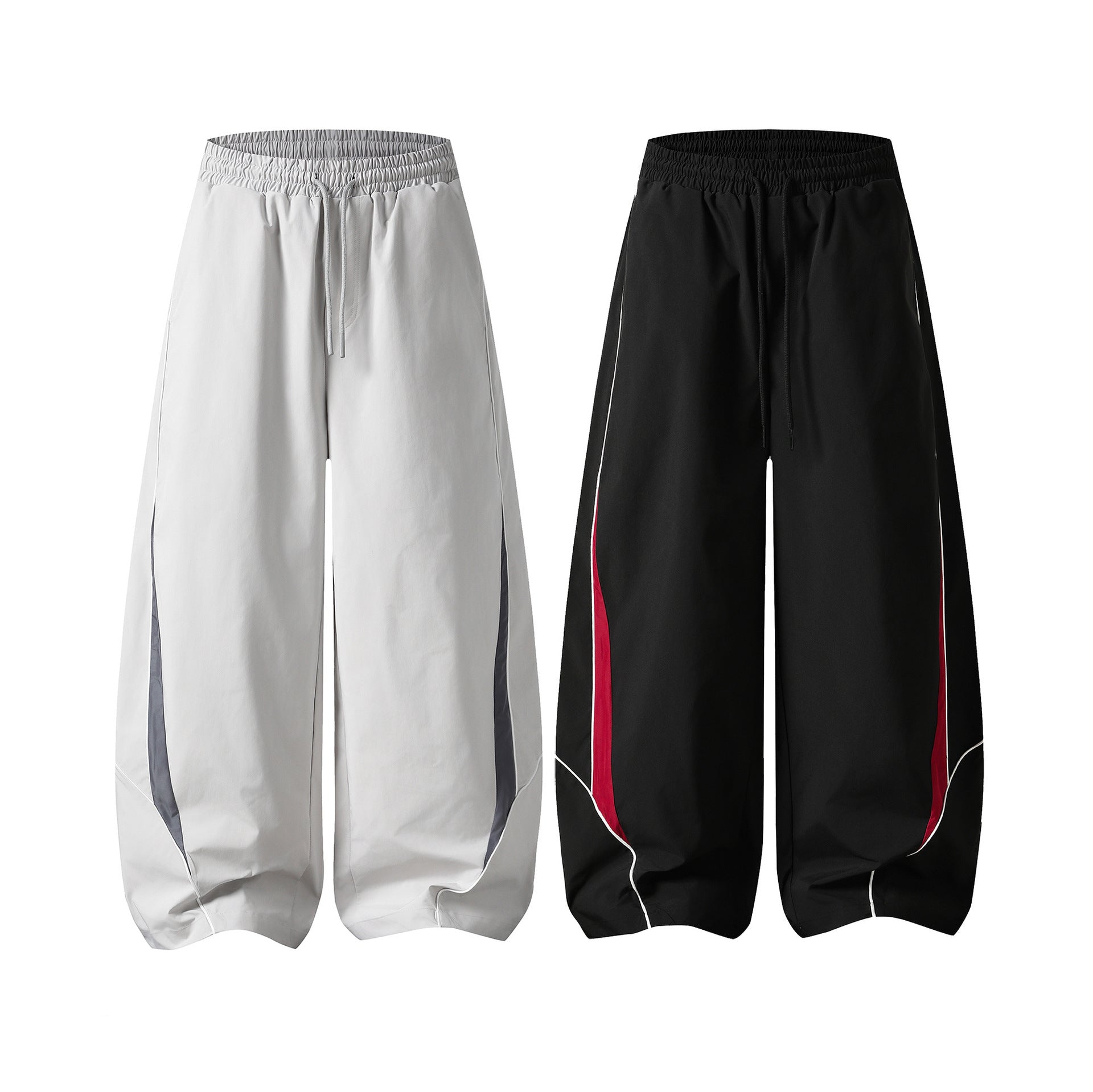 Herren-Trackpants mit kontrastierender Paspel und Colorblock-Seiteneinsätzen