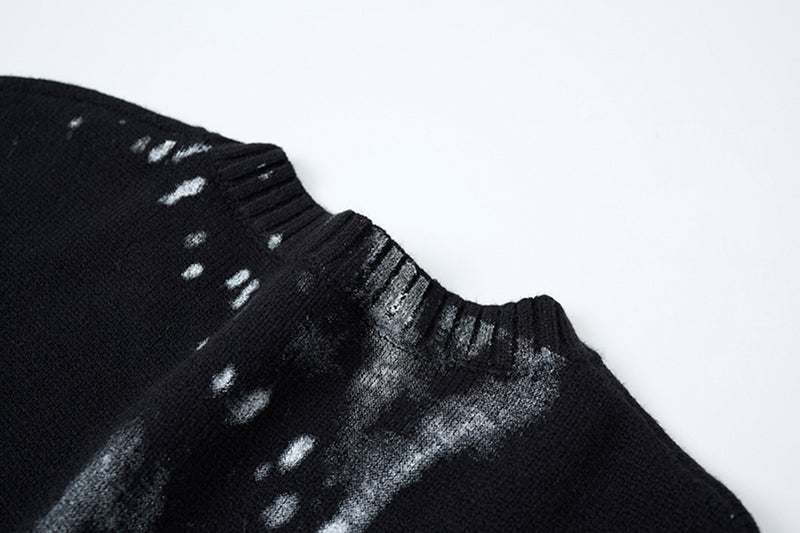 Pull en maille col rond éclaboussures d’encre – Motif peinture déstructuré