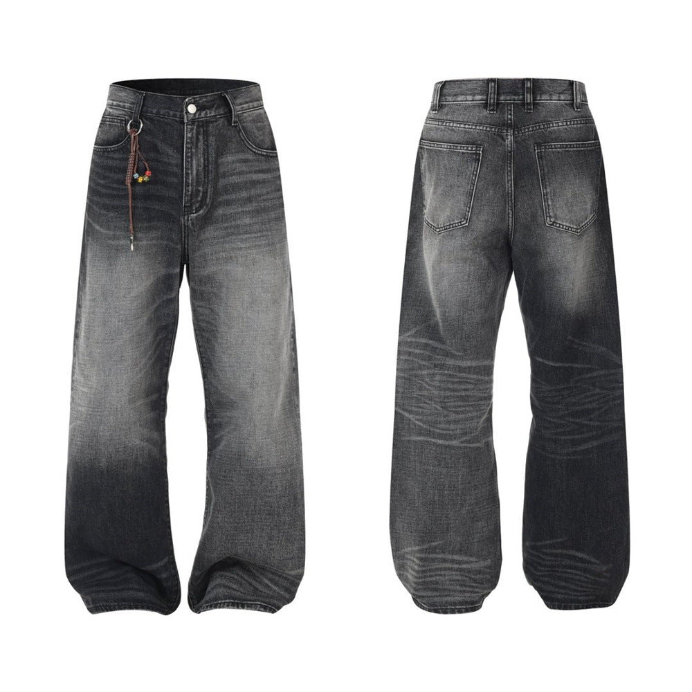 Men's wide-leg baggy jeans in washed black grey gradient denim, front and back view