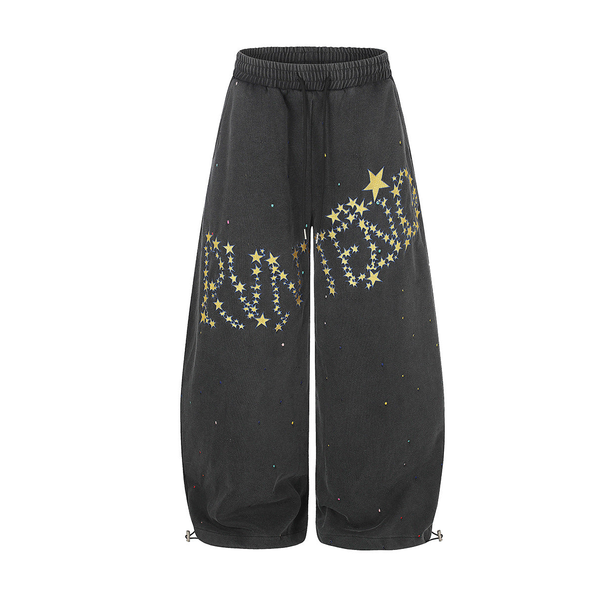 Pantalon de survêtement délavé à jambes larges avec imprimé de constellation d'étoiles jaunes et points façon éclaboussures de peinture, en noir