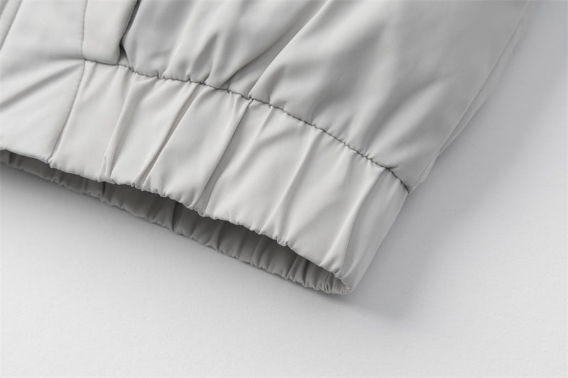Oversized Puffer Bomber Jacket – Stand Collar, Geometric Seam Detail