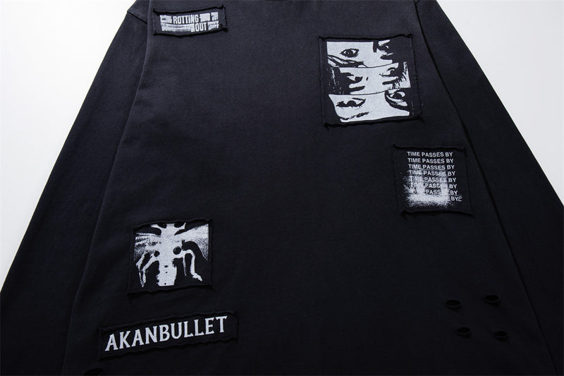 Longsleeve mit dunklen Grafik-Patches – Verwaschenes Oversized-Shirt aus Baumwolle