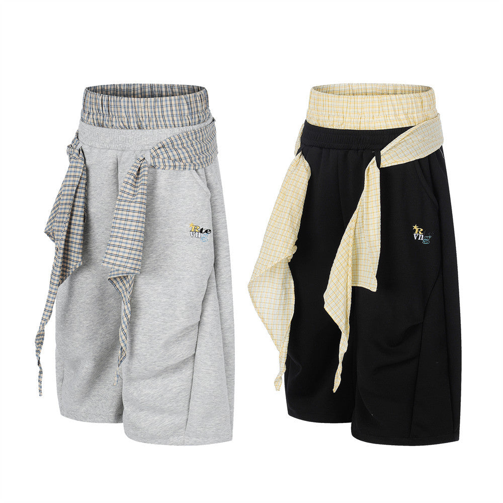 Men's fake two-piece plaid splice double waistband loose fit shorts in grey and black colorways