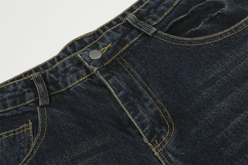 Wide-Leg-Baggy-Jeans mit Taschenbesatz aus Kunstfell und Schriftzugstickerei – Dark Wash