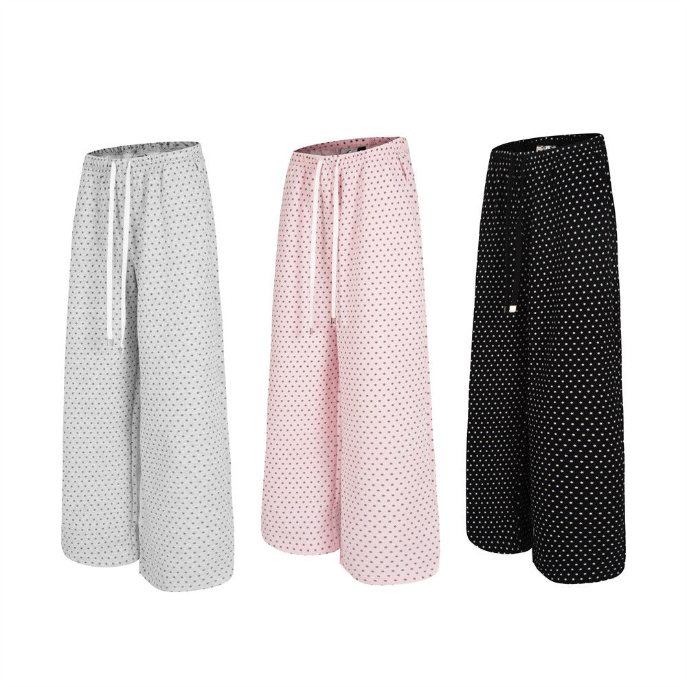 Women's polka dot wide-leg drawstring casual trousers in white, pink, and black