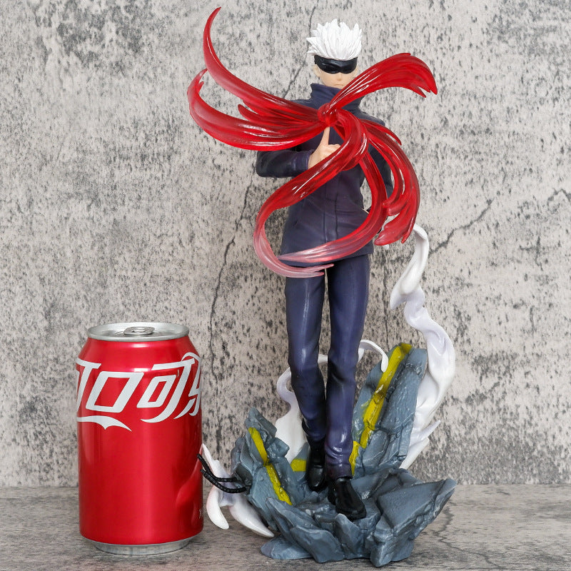 The Jujutsu Kaisen Gojo Satoru PVC Figure, a 28.5 cm collectible statue, features the iconic white-haired character in a dynamic battle pose with black sunglasses and red cursed technique effects on a rocky base. A red soda can for scale contrasts against the gray, textured background.