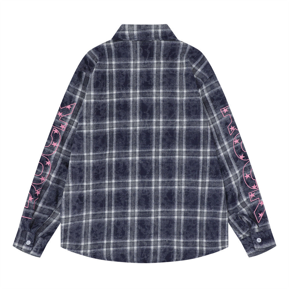 Back view of a navy plaid oversized flannel shirt with pink sleeve graphics