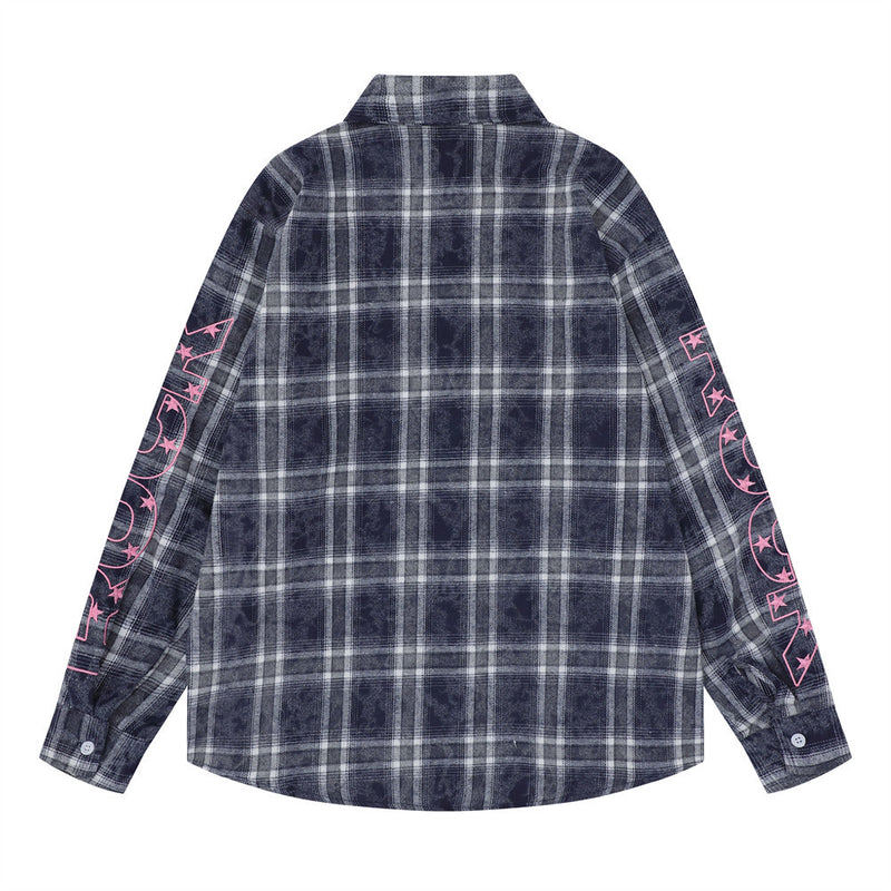 Back view of a navy plaid oversized flannel shirt with pink sleeve graphics