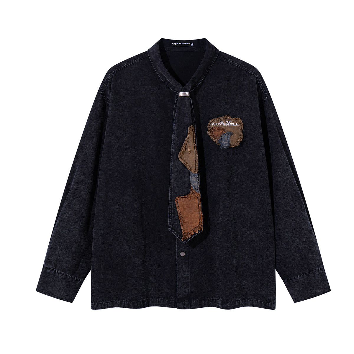 Oversized washed denim shirt with patchwork fabric necktie and embroidered logo appliqué in washed black, front view