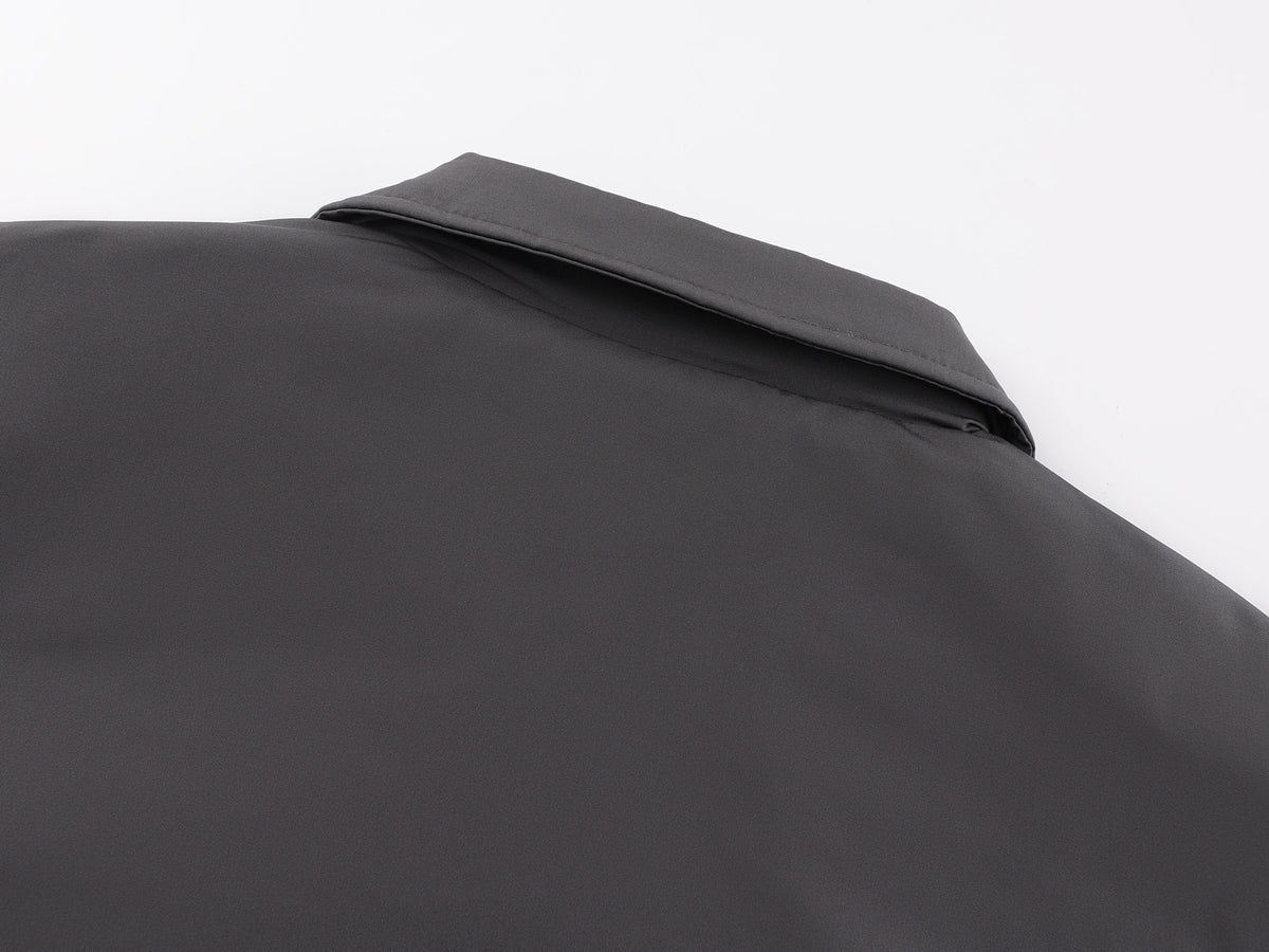Veste bomber matelassée pour homme avec col à pointes et coutures arrondies
