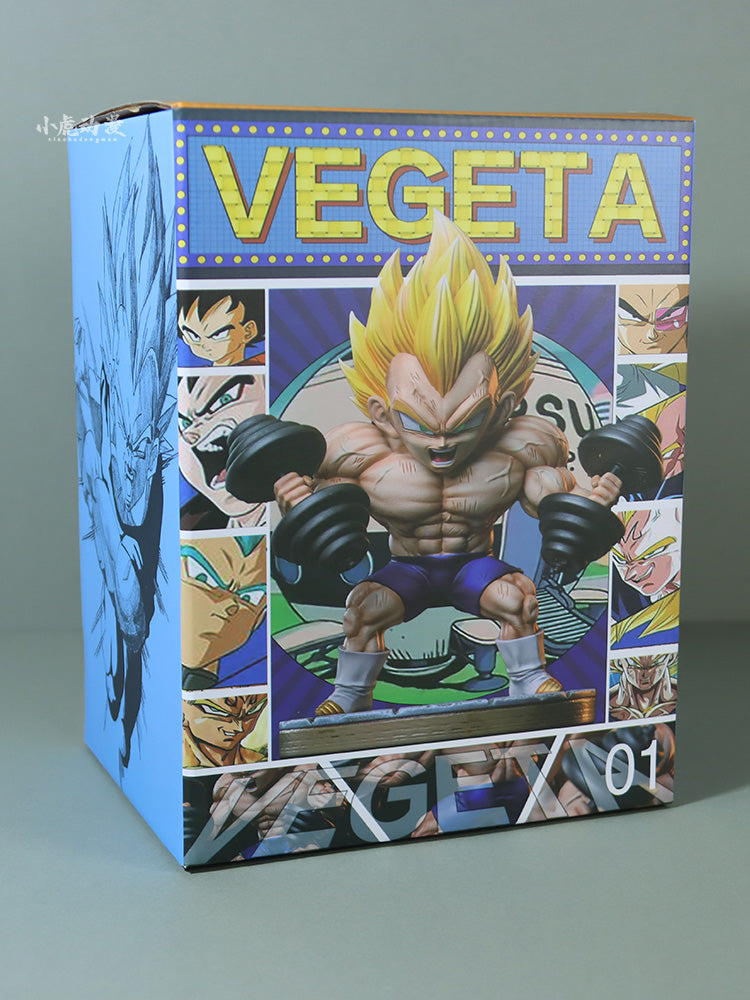 A Seakoff box showcases a 17cm Dragon Ball Z Vegeta Super Saiyan figure in a weightlifting pose, featuring spiky yellow hair. &quot;Vegeta&quot; is prominently displayed at the top with illustrations of the character, and &quot;01&quot; appears at the bottom right.