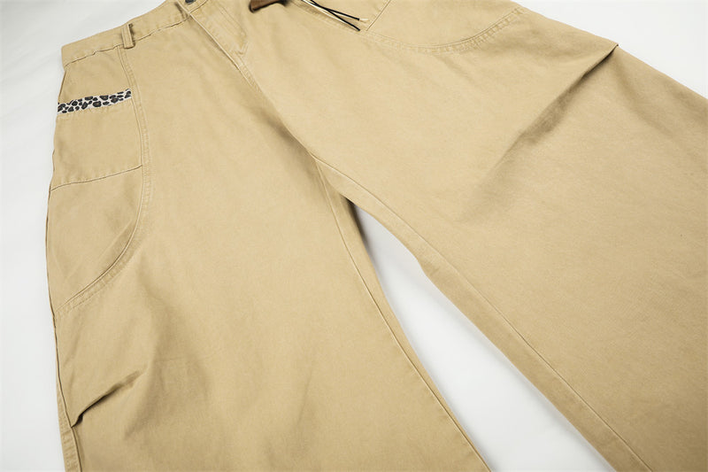 Wide-Leg Baggy Pants with Curved Hem, Leopard Trim & Carabiner Detail