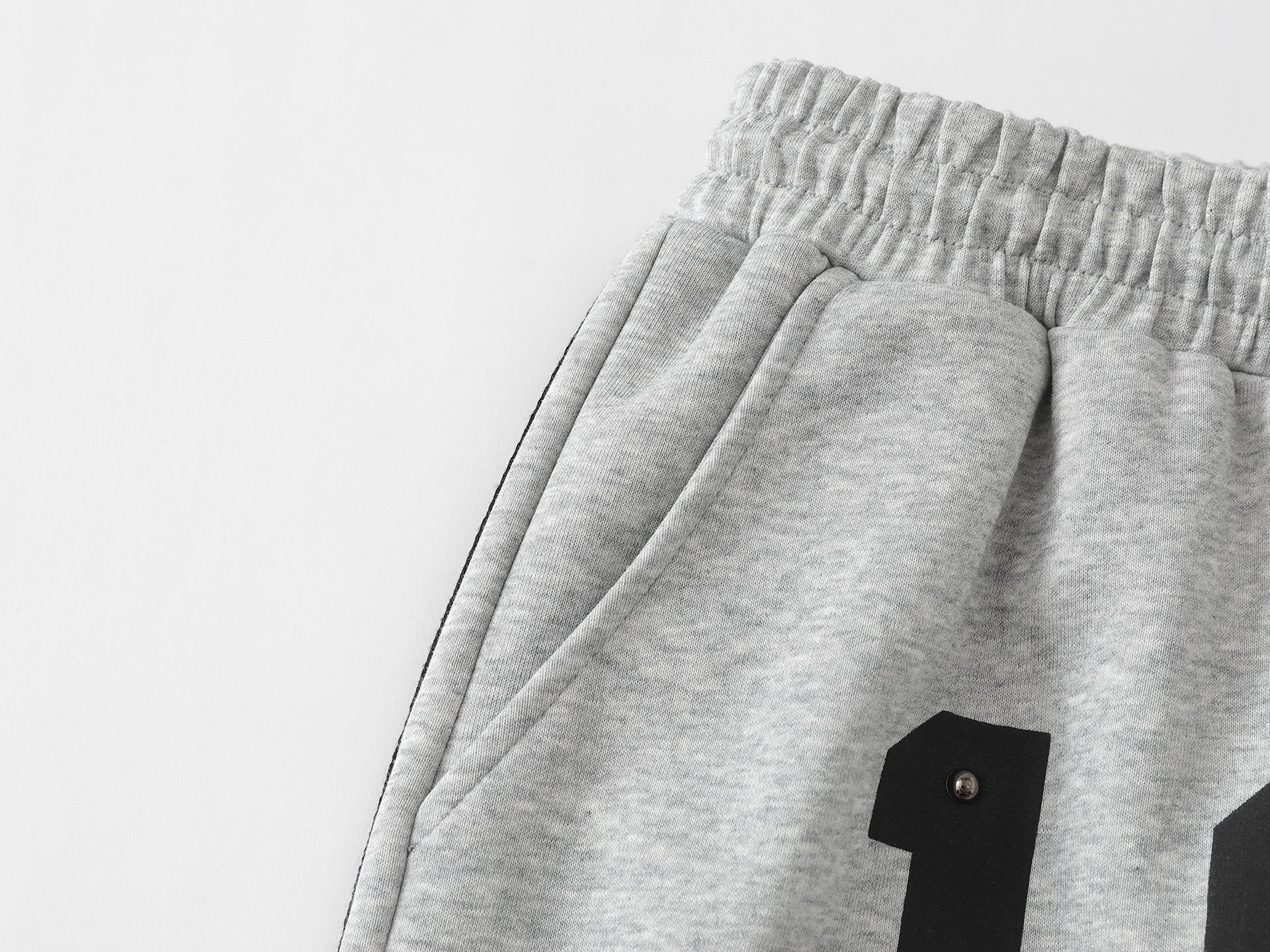 Pantalon de survêtement à jambes larges clouté d’étoiles 1996 avec détail à trois bandes