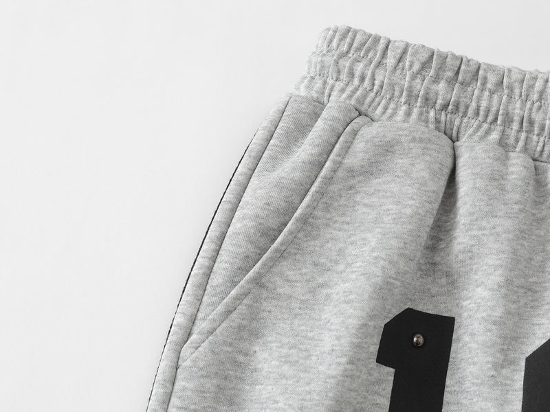 Pantalon de survêtement à jambes larges clouté d’étoiles 1996 avec détail à trois bandes