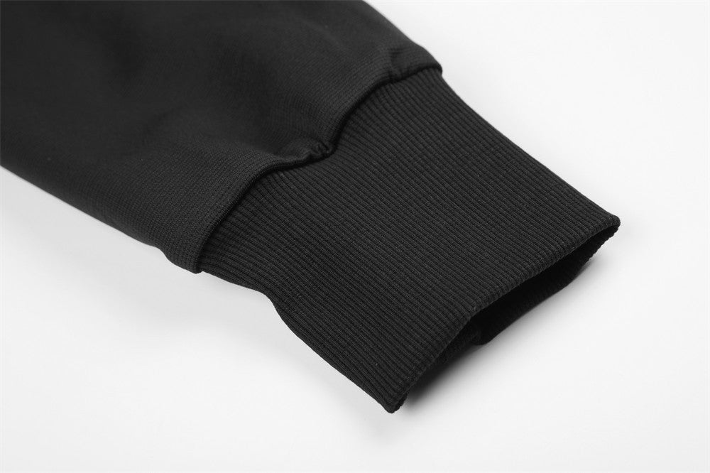 Close-up of black ribbed sleeve cuff on the hoodie jacket
