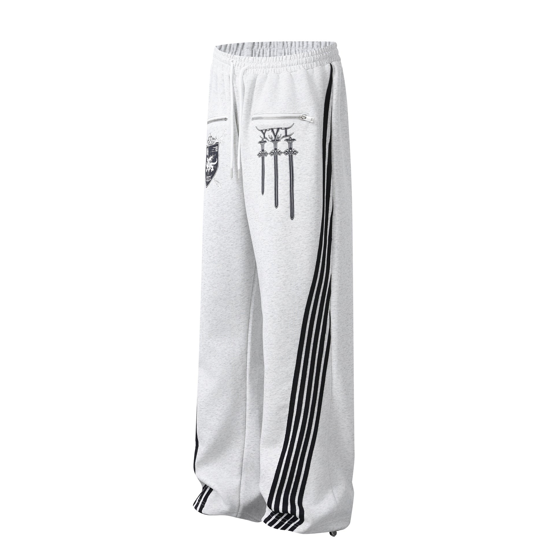Pantalon de survêtement à jambes larges avec graphisme héraldique et détails latéraux multibandes