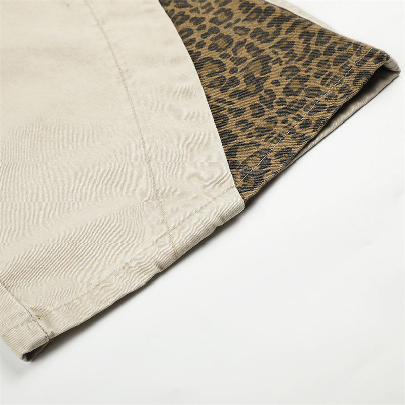 Pantalones de Pierna Ancha con Patchwork de Leopardo – Corte Baggy Deconstruido y Bajo Curvado