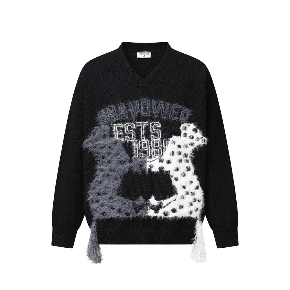 Men's oversized V neck sweater with colorblock cartoon animal jacquard graphic and fringe tassels, shown in black and cream c