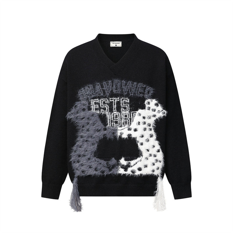 Men's oversized V neck sweater with colorblock cartoon animal jacquard graphic and fringe tassels, shown in black and cream c