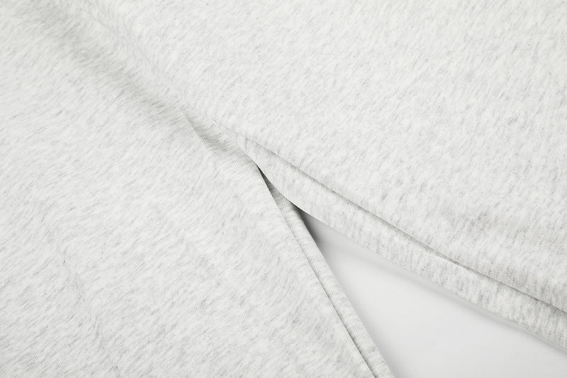 Jogging à jambes larges avec clous – Coupe ample et croix ornée de strass