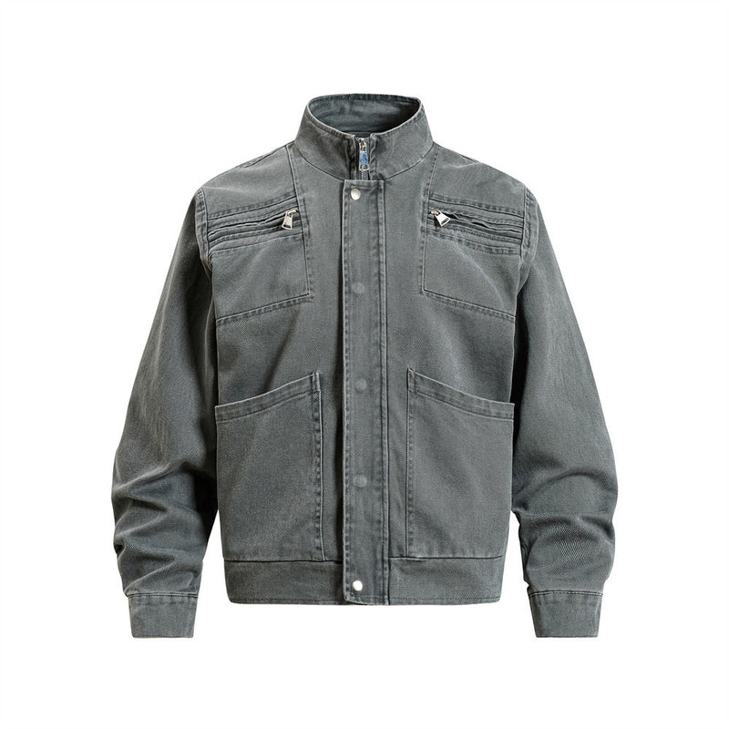 Men's vintage washed denim workwear jacket with stand collar, zip chest pockets, and large patch pockets in charcoal grey