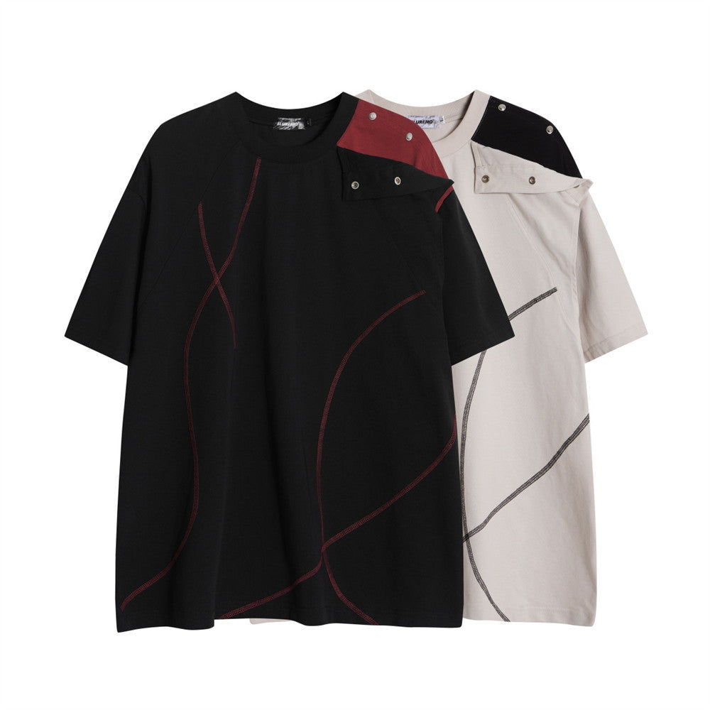 BLUREMO oversized black and beige contrast stitch snap-shoulder t-shirt flatlay streetwear