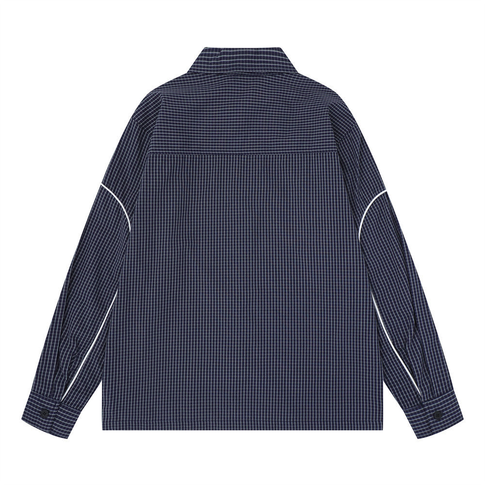 Navy plaid long sleeve shirt shown from the back with white piping on the sleeves