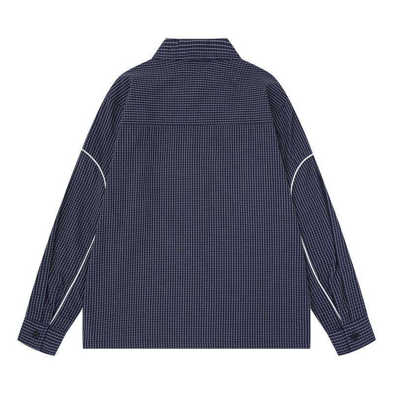 Navy plaid long sleeve shirt shown from the back with white piping on the sleeves