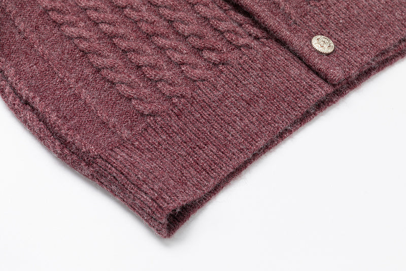 Pull col roulé en maille torsadée avec détail boutonné en diagonale