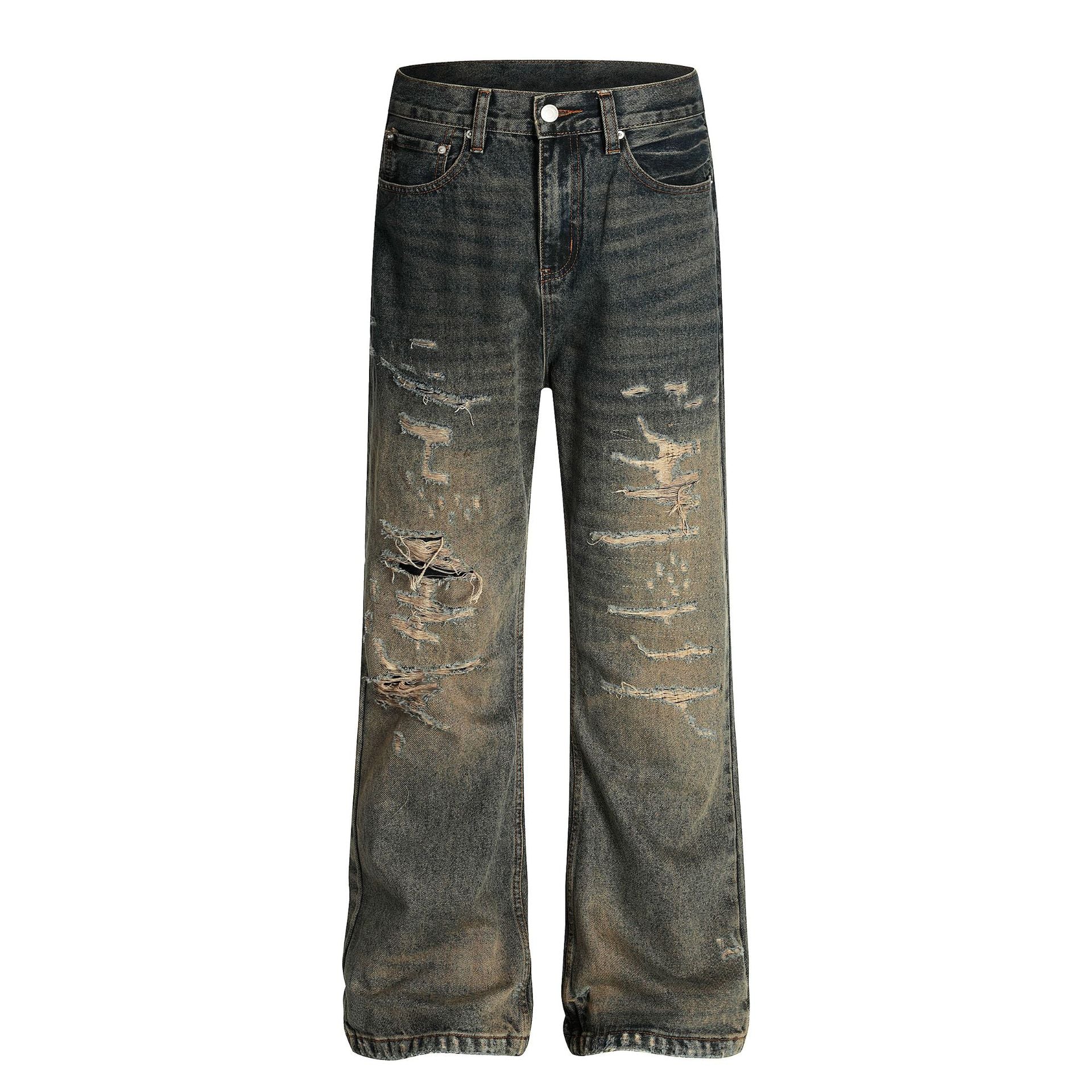 Distressed-Jeans mit geradem Bein in dunkler Vintage-Indigo-Waschung mit Dirty-Dye-Effekt, starken Rissen und ausgefransten Schlitzen an Oberschenkeln und Knie