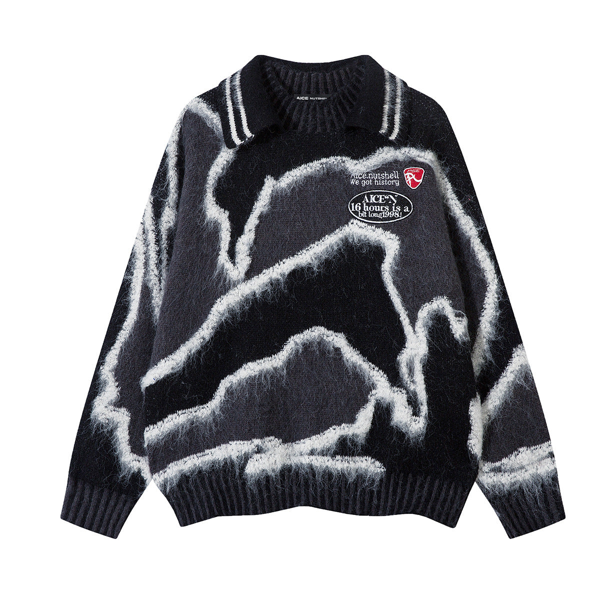 Oversized abstract camo jacquard polo collar knit sweater in black with white contrast pattern and embroidered chest patches