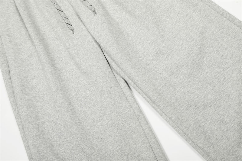 Pantalon de survêtement homme à jambes larges – Coupe ample, taille élastique, coloris uni