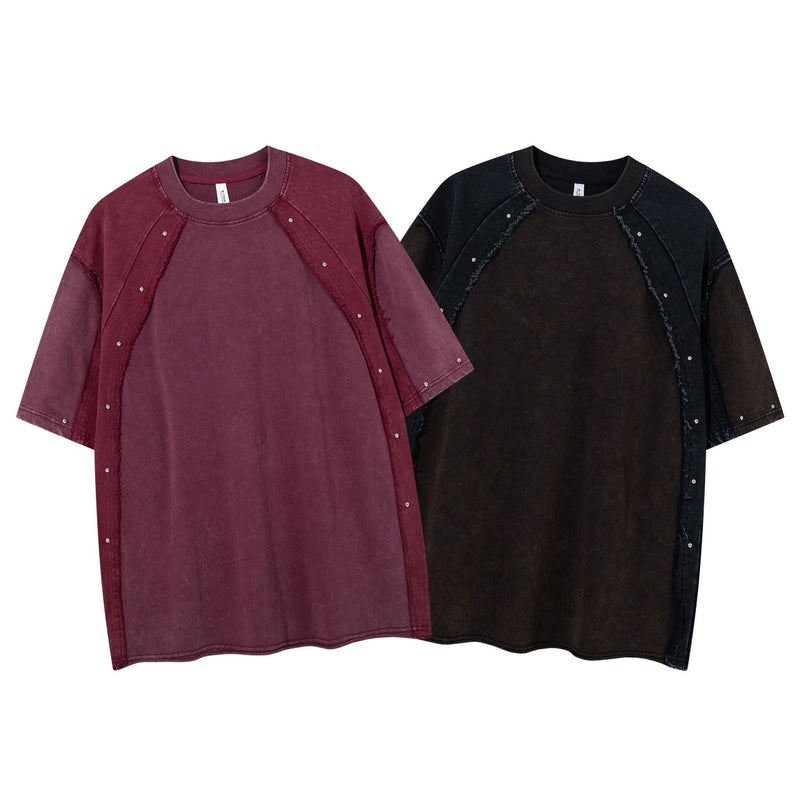 T-shirt patchwork raglan délavé à l’acide, coutures à bords bruts et détails rivetés