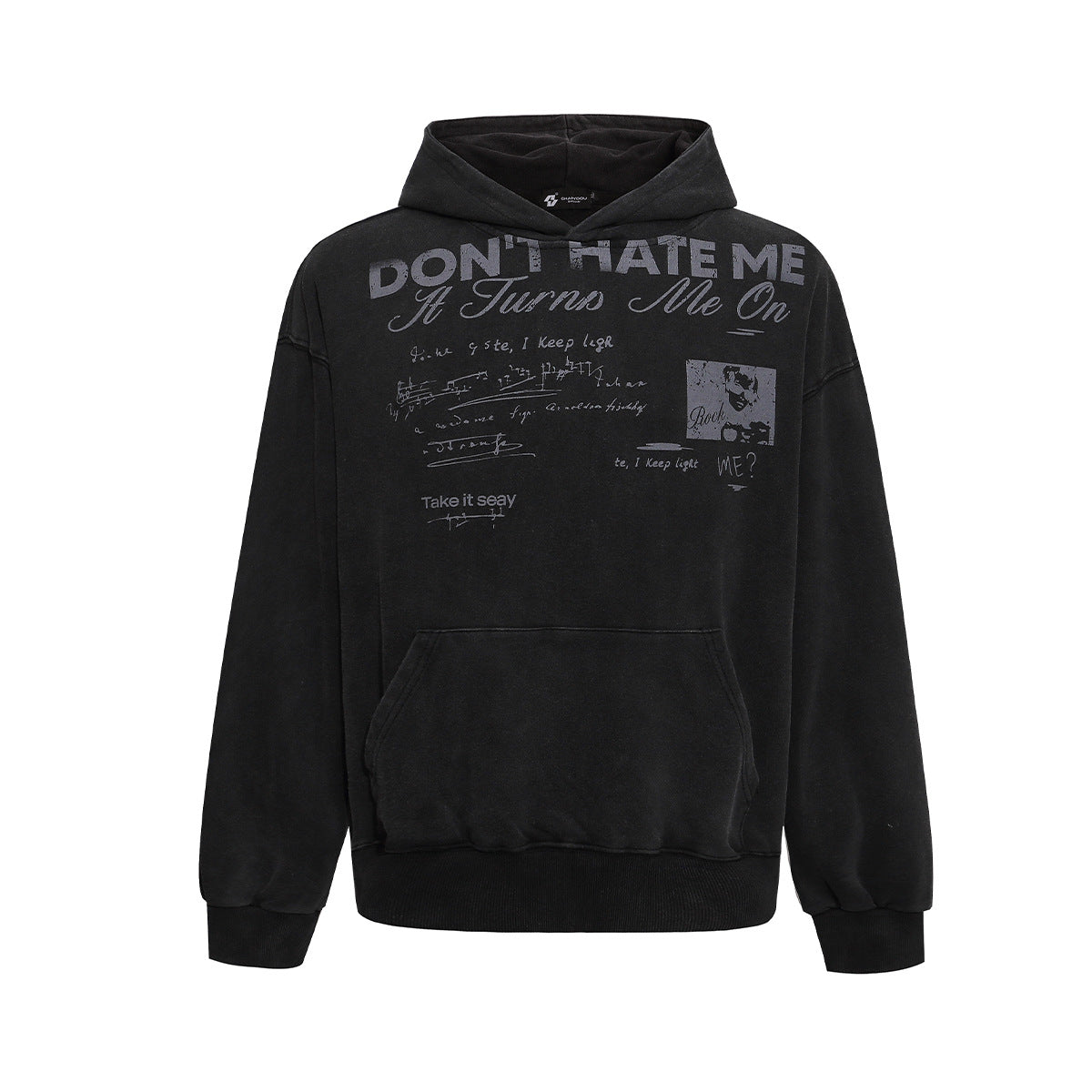 Oversized washed graphic hoodie with 'Don't Hate Me It Turns Me On' vintage rock slogan print in black and off-white