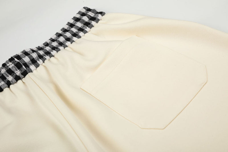 Pantalon de survêtement à jambes larges, imprimé main squelette et taille vichy