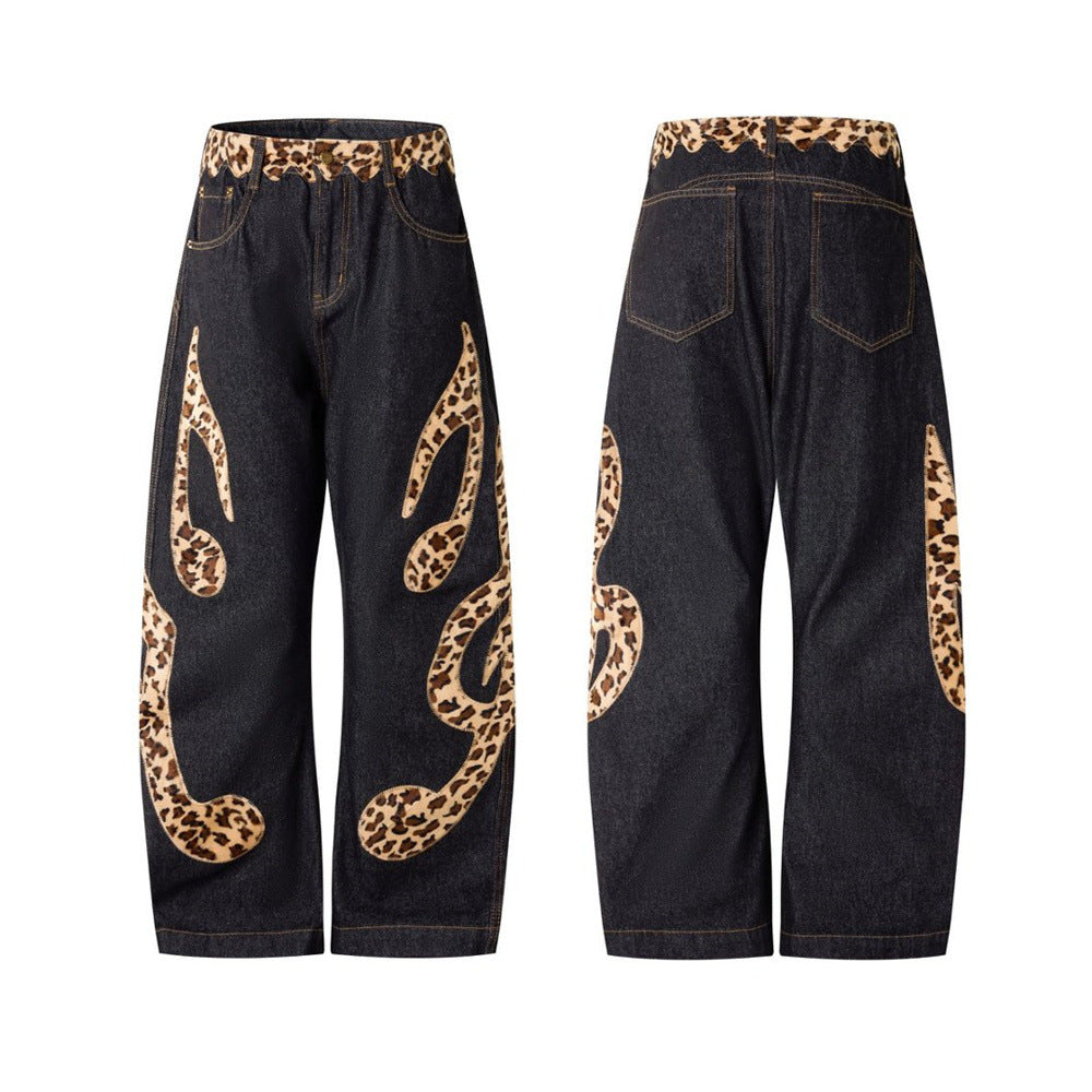 Men's black wide-leg jeans with leopard print appliqué patches and matching leopard waistband, front and back view