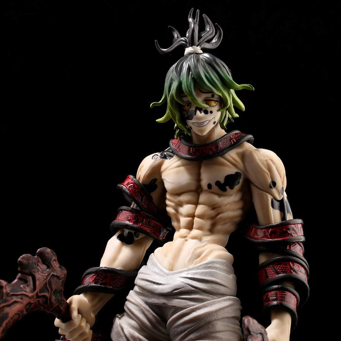 The Gyutaro Demon Slayer Figure is a 29CM PVC action figure featuring vivid green hair, a white waist drape, muscular definition with black markings, and a textured weapon. Black and red details accentuate the arm bands and shoulder piece, perfect for Kimetsu no Yaiba collectors.