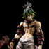 The Gyutaro Demon Slayer Figure is a 29CM PVC action figure featuring vivid green hair, a white waist drape, muscular definition with black markings, and a textured weapon. Black and red details accentuate the arm bands and shoulder piece, perfect for Kimetsu no Yaiba collectors.