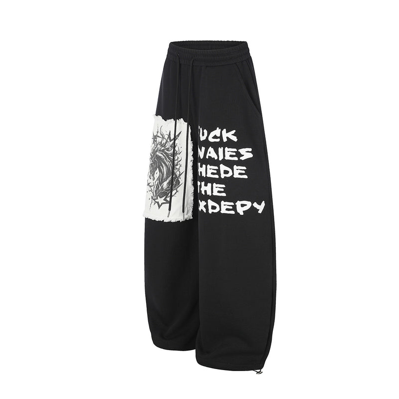 Pantalon de survêtement à jambes larges avec écusson licorne et imprimé graffiti – Streetwear noir