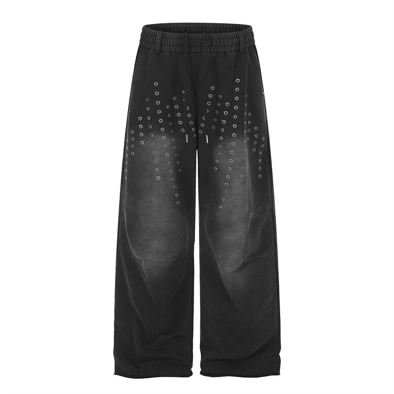 Pantalon de survêtement ample à œillets métalliques, finition délavée à l’acide & ourlet brut