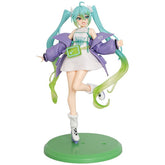 A 21.5 cm PVC figure of Hatsune Miku, featuring turquoise twin tails, cat ears, a white dress, purple jacket, and green accessories. She strikes a playful pose on one leg atop a green base, embodying her lively essence. This collectible is known as the "Hatsune Miku Waist Bag Cheerleader.