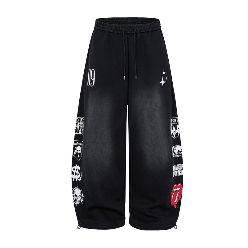 Wide-leg graphic sweatpants with vintage washed finish, skull and sport badge prints, in Black colourway