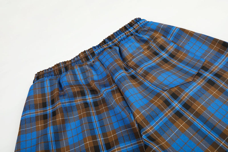 Wide-Leg Plaid Pants – Blue Tartan Baggy Fit with Crest Graphic & Drawstring Hem