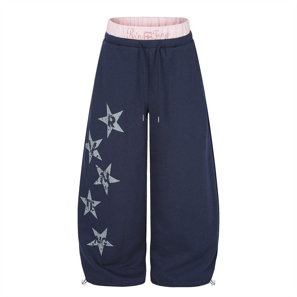 Oversized wide leg sweatpants with star print and contrast double waistband in navy with pink waistband