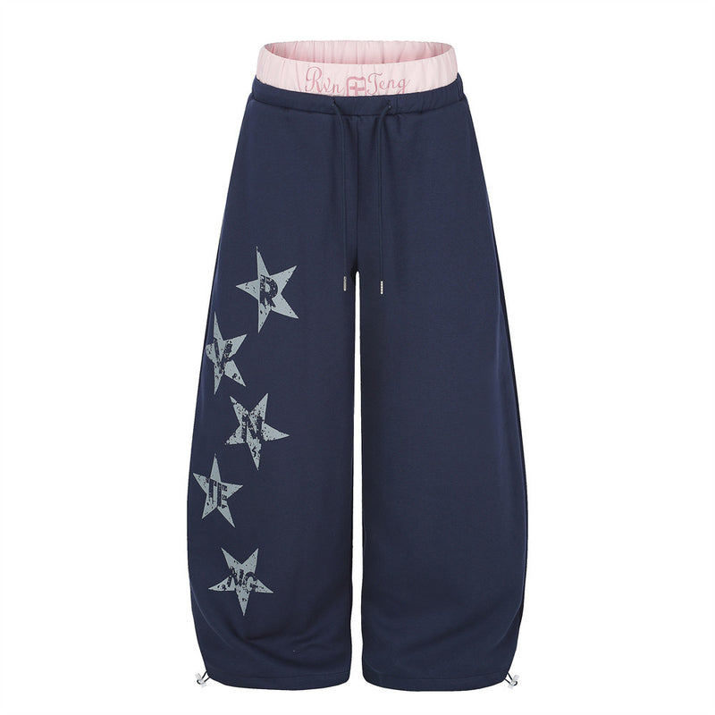 Oversized wide leg sweatpants with star print and contrast double waistband in navy with pink waistband