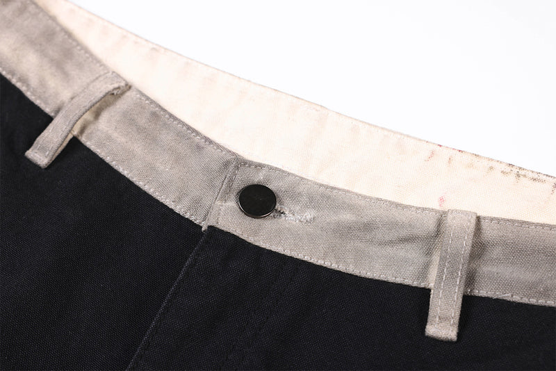 Wide-Leg-Patchworkhose – abstraktes Wellenmuster aus zweifarbigem, schwarz-grauem Washed-Denim