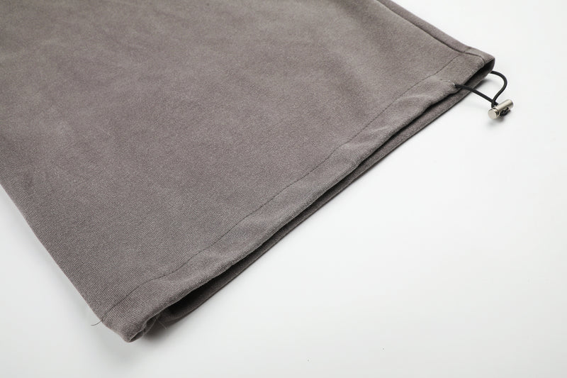 Pantalones de chándal de pierna ancha con cruz estampada y acabado lavado ácido