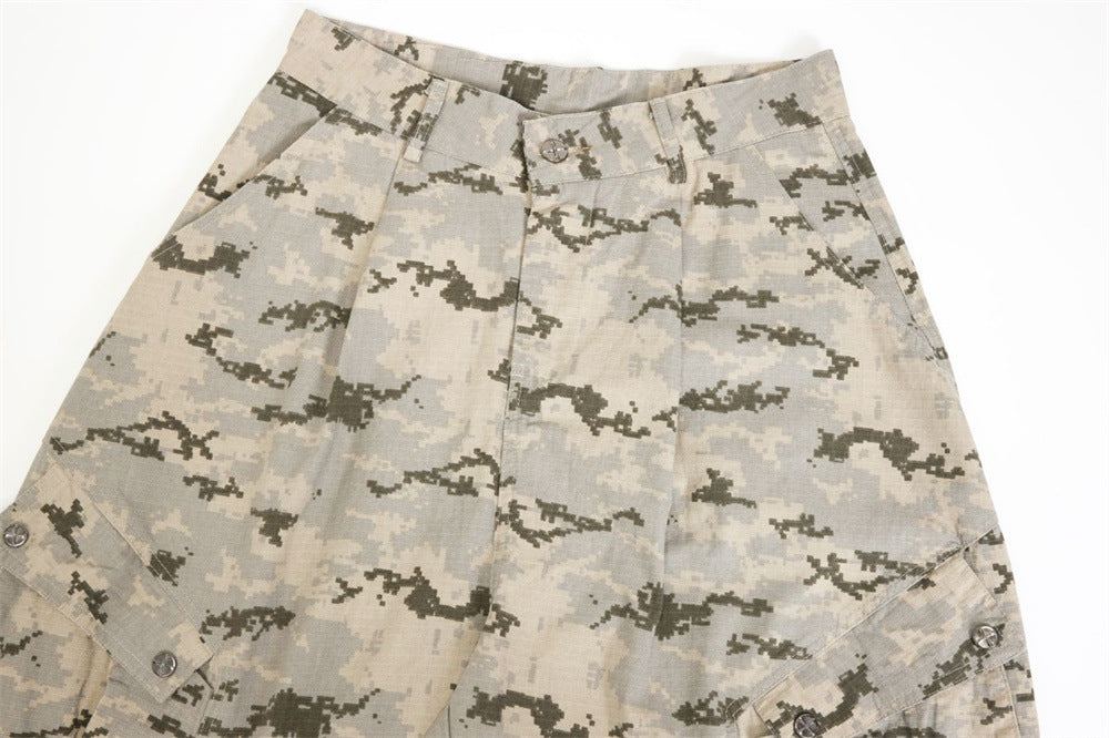 Close-up of desert camo pants waistband and pleated front detail